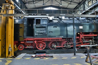 Steam locomotive of the Harz narrow gauge railway in a workshop