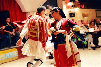 Tourists encounter impressive evidence of Roman and Greek history on a round trip through western Turkey and to the Greek island of Rhodes. The picture shows: Folk dance group in front of and with tou...