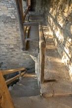 Stairway to the historic town wall with covered battlements