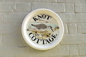 Sign with house name