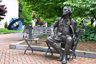 George Washington statue on a bench at George Washington University