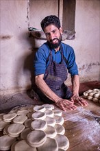 A baker in his bakery