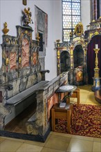 Choir stalls and confessional