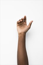 Black person holding their hand up