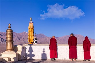 Three monks at Thikse Monastery