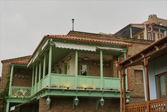 Typical house with wooden balcony