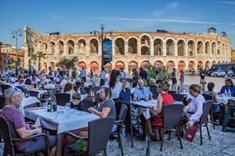 Restaurant terraces in Piazza Bra in front of the Arena di Verona