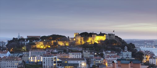 View over Sao Jorge castle at night
