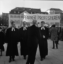 Those who support the Vietnam War betray the gospel of love. Pastors protest. With these slogans and sometimes wearing their robes