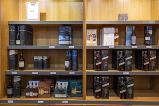 Various whisky bottles on a shelf