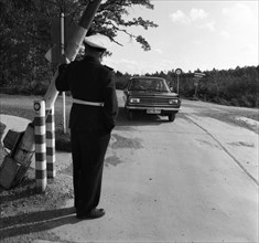 Government representatives with their vehicles in 1966 during a police check at the hitherto secret atomic bunker of the Federal Government in the Ahr valley