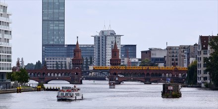 Spree with Oberbaum Bridge and Treptowers high-rise