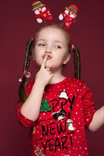 Funny little girl in the New Year's image