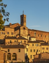 Chutch-tower of Convento di San Francesco and townhouses in early morning light