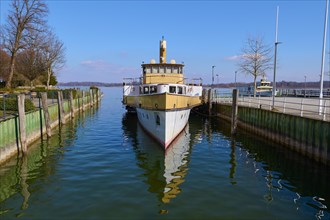 Lake Ciemsee with pier and paddle steamer