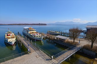 Lake Ciemsee with pier and excursion boat