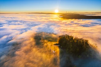 Drone view of sunrise with clouds over valley Remstal in autumn