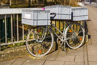 Bicycle with plastic containers from foodsharing