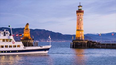 Harbour with lighthouse and Bavarian Lion