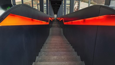 Dark illuminated staircase downwards