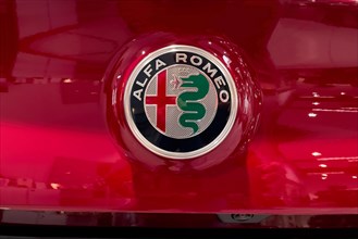 Colour Logo Emblem of Alfa Romeo with Sword and Snake on Red Car Sports Car Alfa Romeo Giulia Estrema