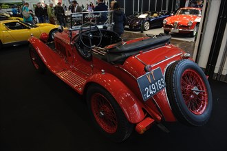 View from behind of historic sports car classic car pre-war car 30s Alfa Romeo 6c 1750