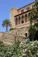 Tower and porch with arches in Andalusian style Archway of Alcazar Real Palazzo Reale dell Almudaina