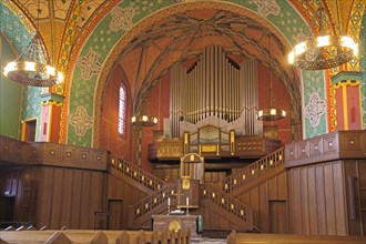 Interior view with chandelier and organ of the Lutherkirche