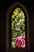 Church window with red rose of the Marktkirche
