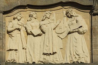 Relief with four musicians singer
