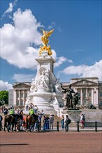 Mounted police in front of the Victoria Memorial at Buckingham Palace