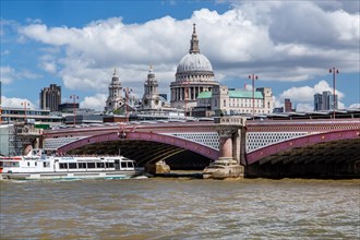 Excursion boat on the Thames with Blackfriars Bridge and St. Paul's Cathedral