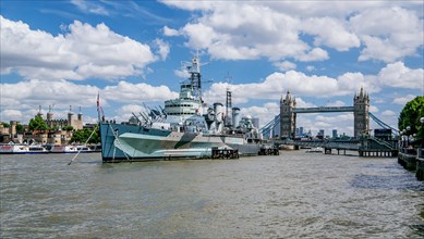 Museum Ship HMS Belfast on the Thames with Tower and Tower Bridge