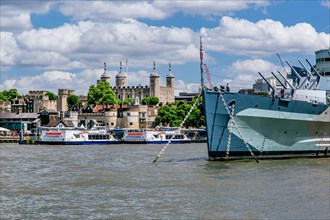 Museum Ship HMS Belfast on the Thames with Tower