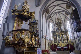 Baroque pulpit and altar in the Church of St. James