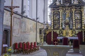 Baroque altar and frescoes in the Church of St. James