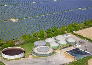 Aerial view of a biogas plant and solar field