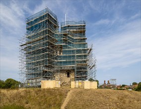 Orford Castle surrounded by scaffolding during restoration project by English Heritage