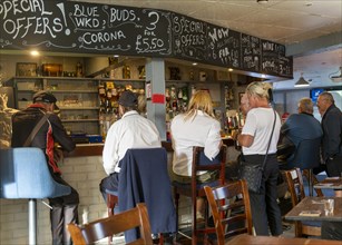 Customers inside The Welcome public house