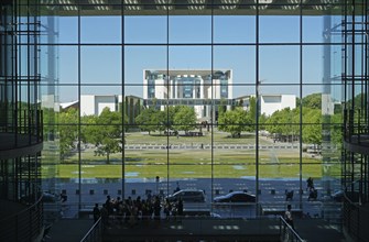 View from the atrium in the Paul Loebe House through glass facade onto the Federal Chancellery