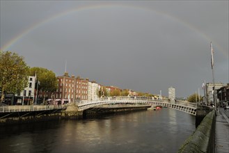 A rainbow over the River Liffey at the Hapenny Bridge