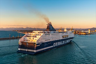 Grimaldi Lines Cruise Ship at sunset in Port of Livorno