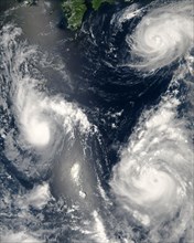 Three different typhoons were spinning over the western Pacific Ocean on August 7