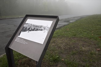 Old photo as a reminder of the Carachoweg in the fog at beech forest concentration camp
