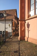 Narrow alley between the bell ringer's house and the town church in Michelstadt