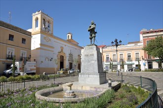Plaza de Cervantes with church Iglesia de San Andres and monument to painter Francisco de Zurbaran in Badajoz