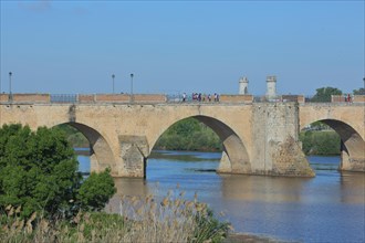 View of historic Puente de Palmas built in the 15th century over the Rio Guadiana in Badajoz