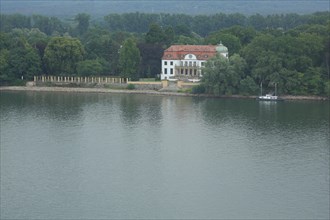 View over the Rhine to Villa of Count Adalbert Franken von Sierstorpff on Koenigklinger Aue and Eltviller Aue opposite Eltville