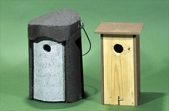 Two different nestboxes for small garden birds like great tits