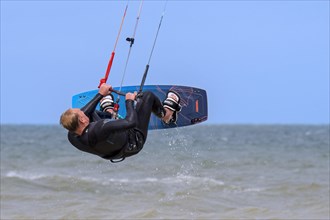 Kitesurfing showing kiteboarder